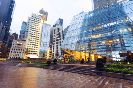 Blog 76 Panorama of a city plaza at sunset.