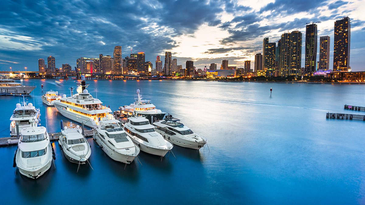 Boats at a marina at sunset