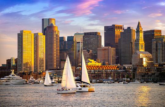 Panoramic view of Boston cityscape at sunset