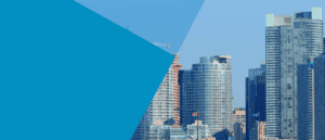 Panoramic view of a bustling cityscape featuring tall skyscrapers and glowing lights.