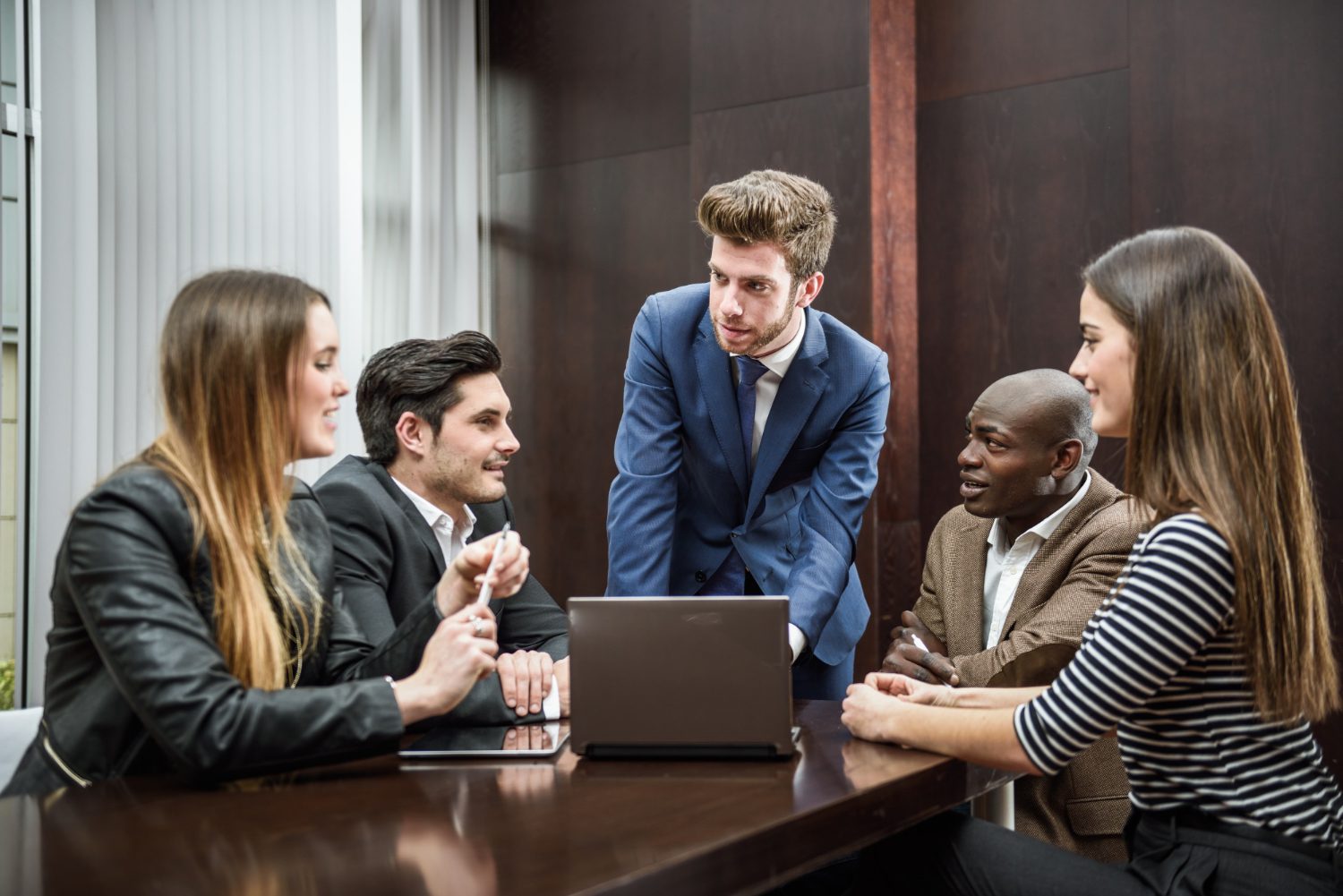 Blog 16 Group of professionals discussing how to create Workday Okta Integration