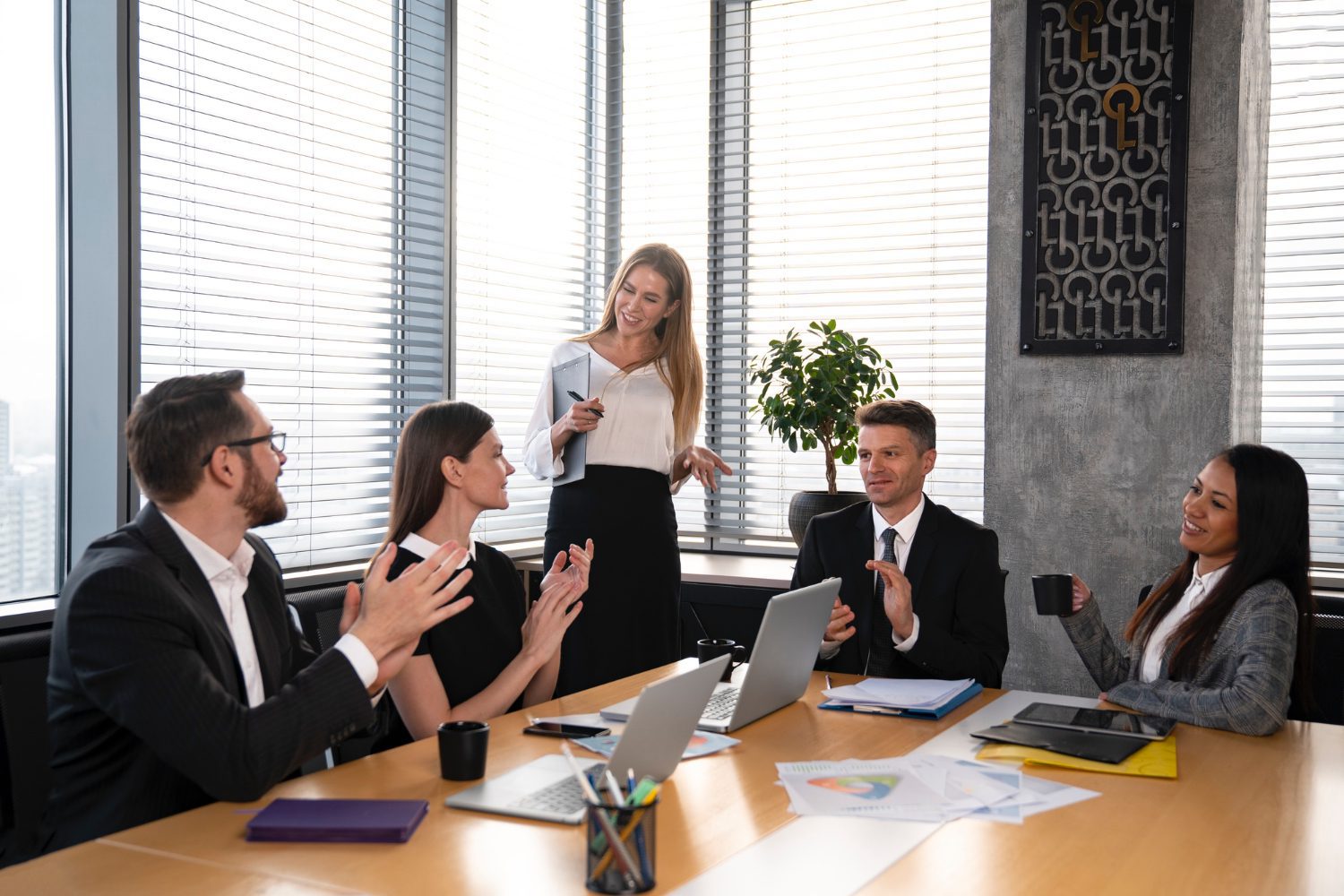 Blog 31 A group of associates discussing the implementation of their new multi factor authentication