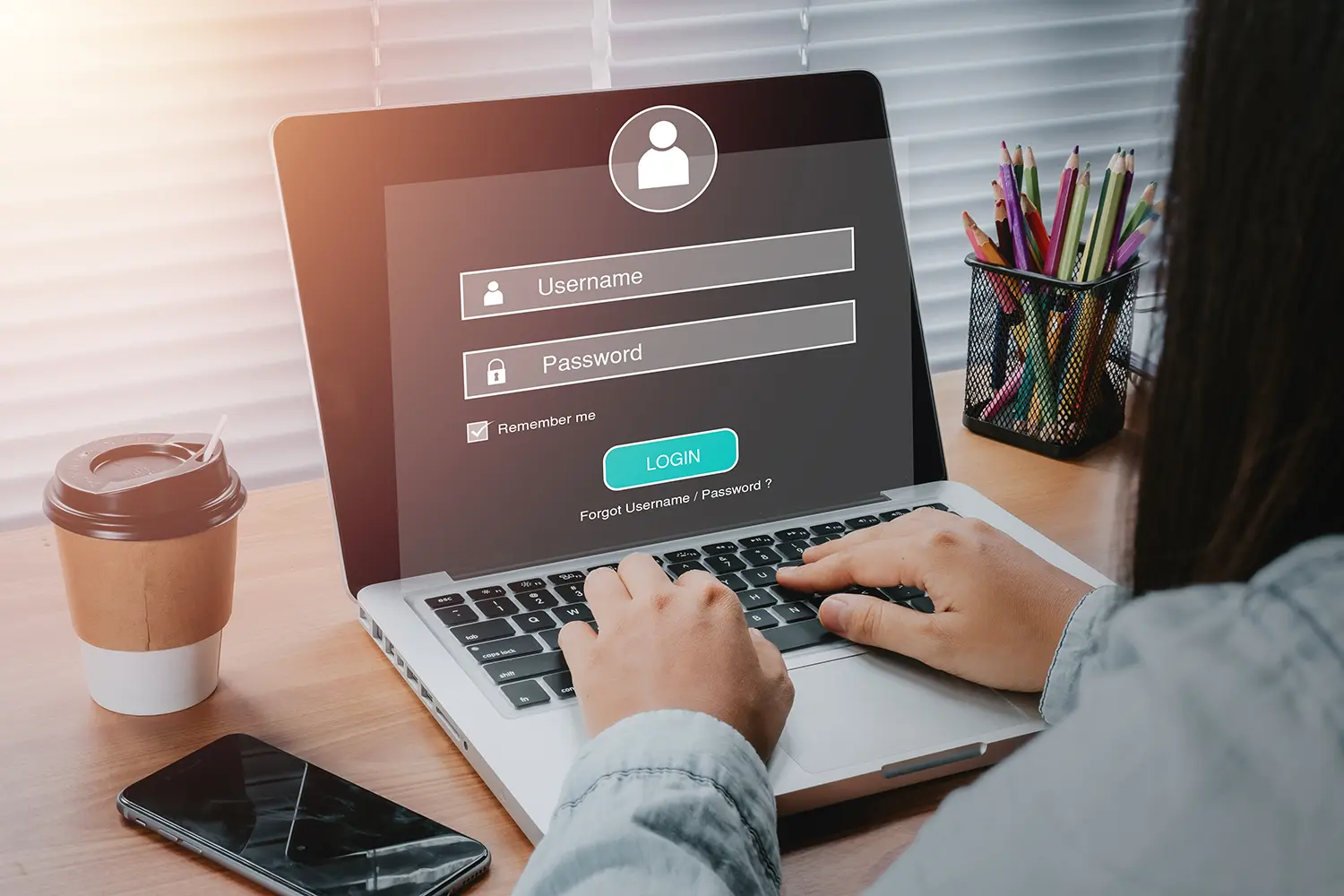 How To Homepage 13 Person hand typing on keyboard with login and password on screen display, cyber security concept, data protection and secured internet access.