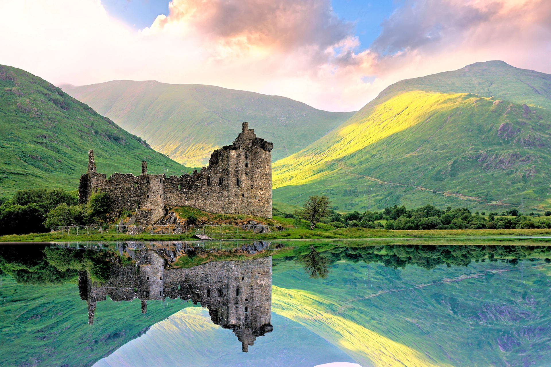 How To Homepage 1 The ruins of a castle in a lush valley overlook a scenic lake at sunset. Paycom integration to Google Workspace with Hire2Retire makes managing the JML process as stress-free as this scene.