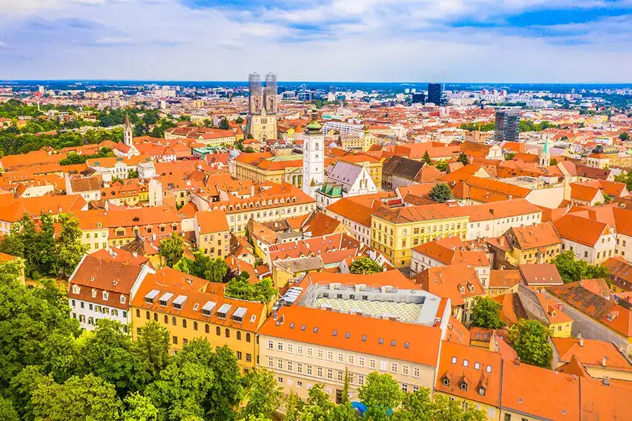Blog 15 Paycom_to_Okta Featured image_ of an old town scenic view