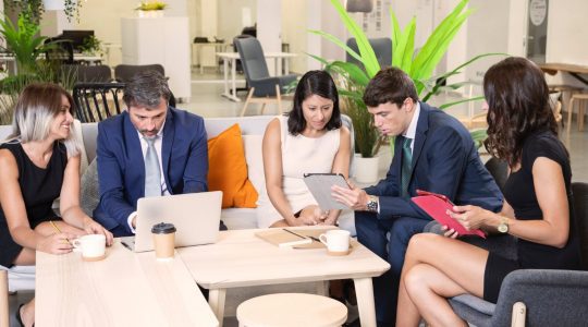 A group of corporate employees updating their Greenhouse integrations.
