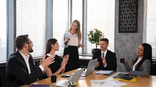 A group of associates discussing the implementation of their new multi factor authentication