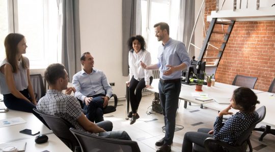 An HR department leader talks with his team about which Ceridian Integrations are right for his organization’s Google Workspace.