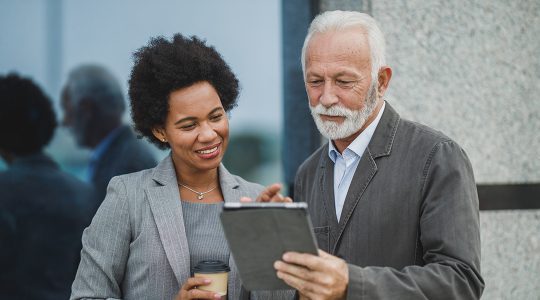 Two business people having a conversation.