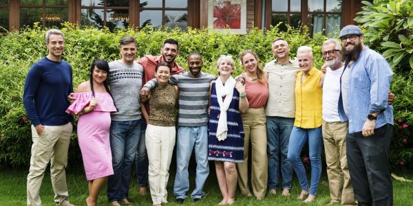A Group of friends taking picture together after Hire2Retire implementation in their organization